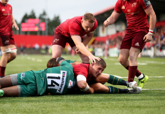 Munster's Dan Goggin scores a try
