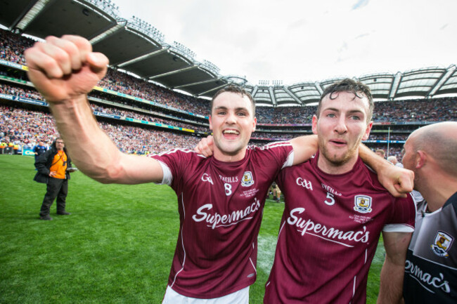 Johnny Coen and Padraic Mannion celebrate