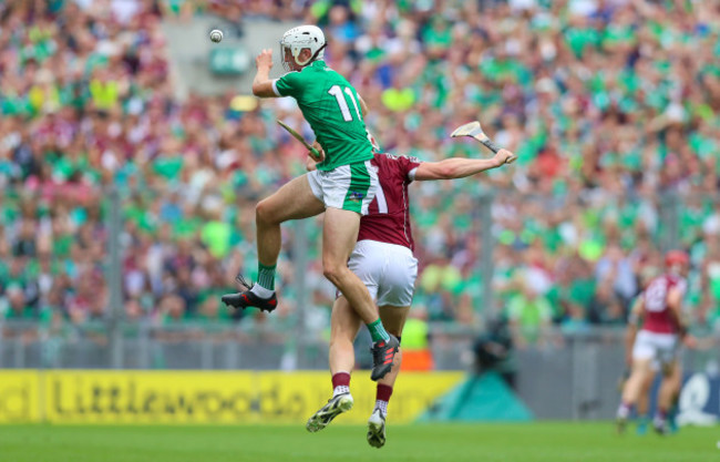 Kyle Hayes collides in the air with Joe Canning
