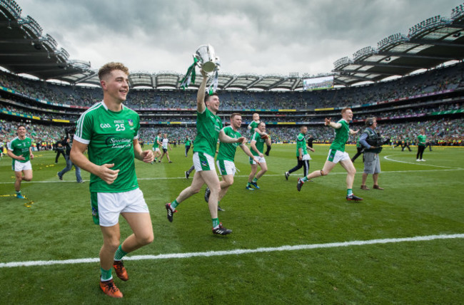 Declan Hannon celebrates after the game with the Liam MacCarthy