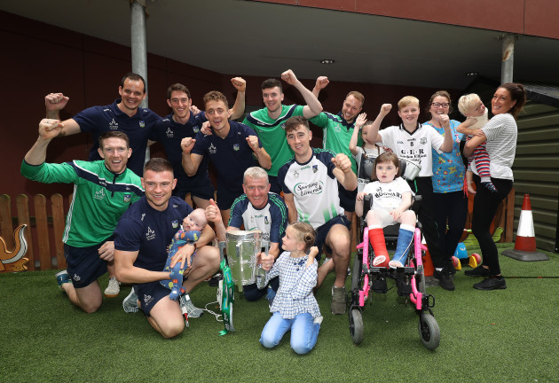 Members of the Limerick team with parents and patients of Our Lady's Children's Hospital Crumlin