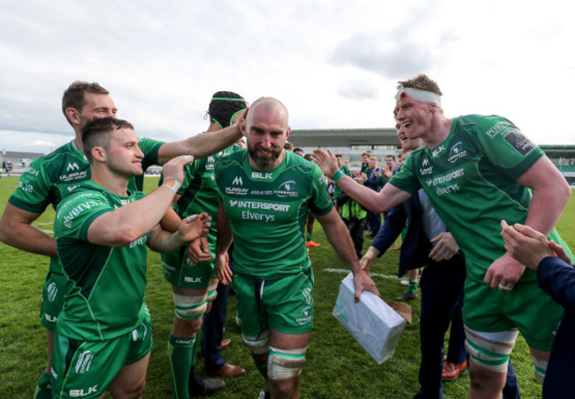 John Muldoon celebrates with teammates after the game