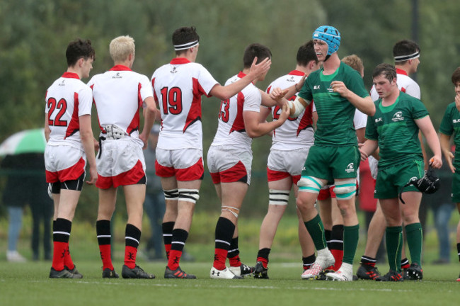 Both teams shake hands after the game