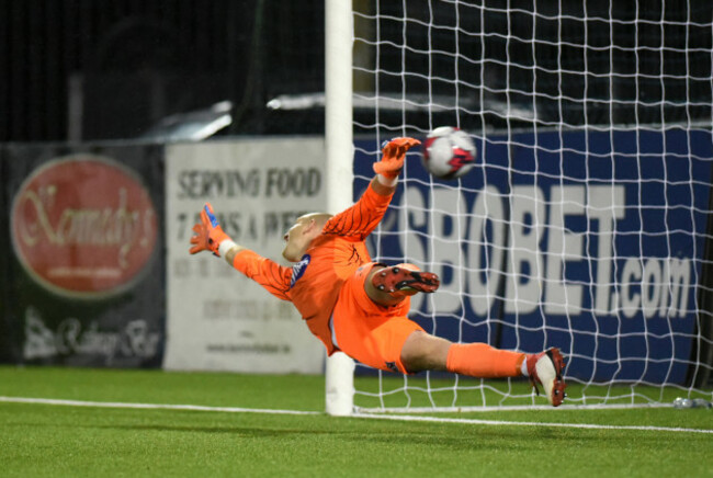 Gary Rogers fails to stop Dylan Watts from scoring an injury time penalty to win the game