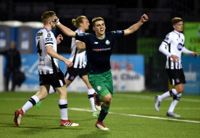 Dylan Watts celebrates scoring the winning penalty in injury time
