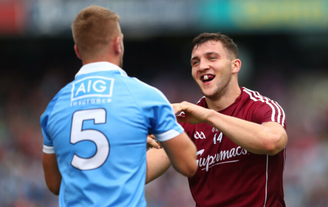 Jonny Cooper and Damien Comer