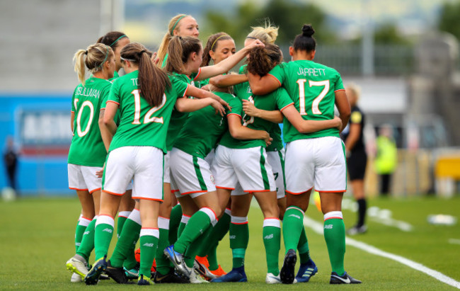 Leanne Kiernan celebrates scoring with her teammates