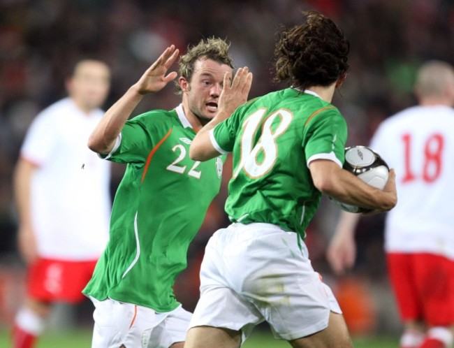 Stephen Hunt celebrates scoring a penalty with his brother Noel