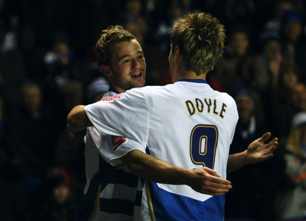 Noel Hunt celebrates with Kevin Doyle after scoring