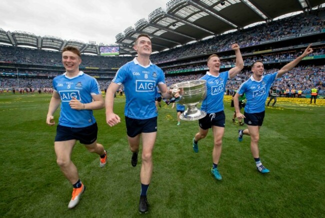 John Small, Brian Fenton, Ciaran Kilkenny and Cormac Costello celebrate with the Sam Maguire