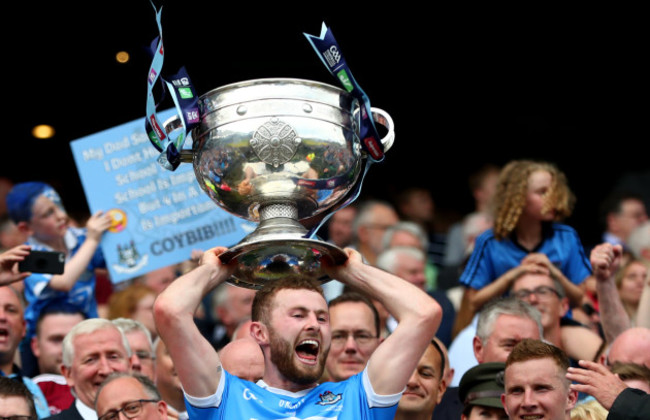 Jack McCaffrey celebrates with Sam Maguire.