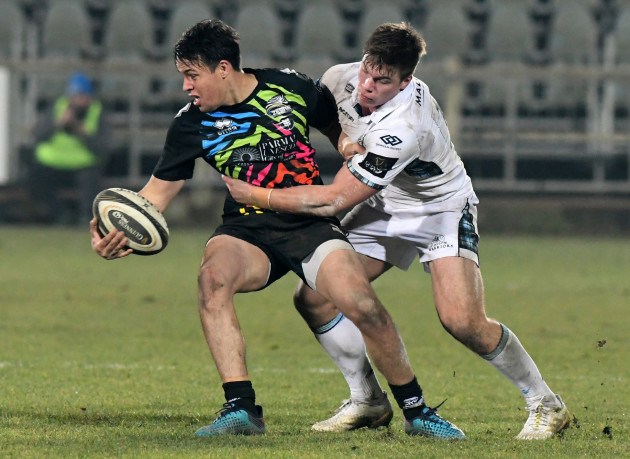 Rory Parata tackled by Huw Jones