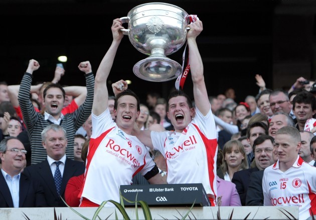 Colm and Sean Cavanagh lift the Sam Maguire