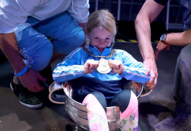 Ella O'Gara, age 7, daughter of Eoghan O'Gara, with the Lord Mayor's medal