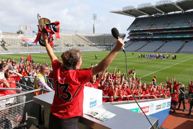 Niamh Mallon lifts the Kay Mills cup