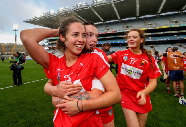 Julia White celebrates with Ashling Thompson and Meabh Cahalane