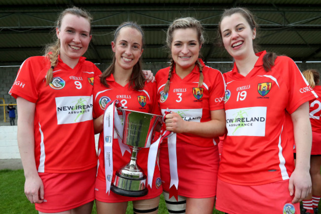 Sarah Buckley, Leah Weste, Sarah Harrington and Finola Neville celebrate winning the League 2 title