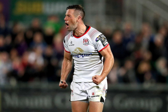 John Cooney celebrates at the final whistle after kicking the winning penalty