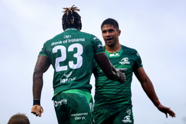 Niyi Adeolokun celebrates his try with Jarrad Butler