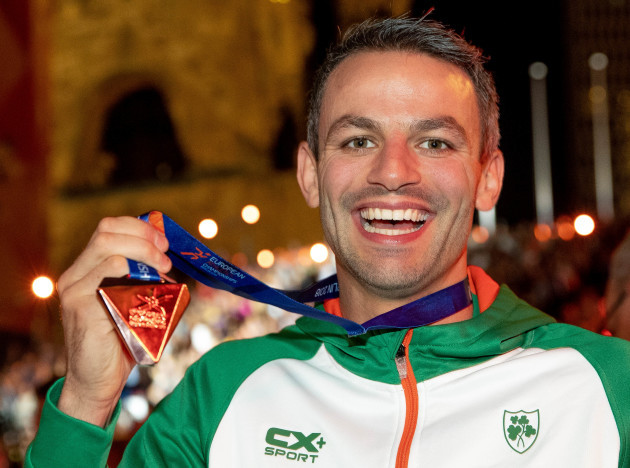 Thomas Barr with his bronze medal