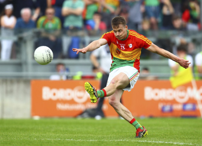 Carlow's Paul Broderick kicks a free