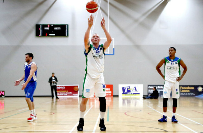 Kieran Donaghy takes free throw as Trae Pemberton watches on