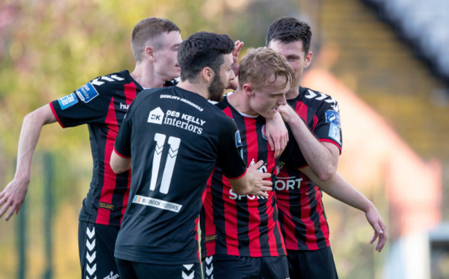 Bohemians players congratulate goal scorer JJ Lunney after scoring a goal