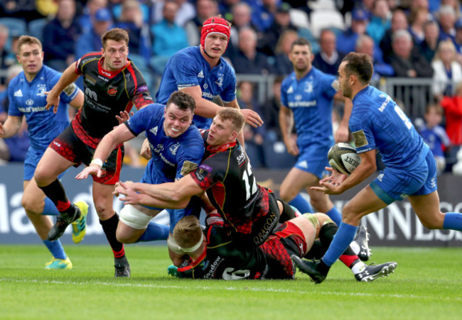 James Ryan offloads to Jamison Gibson-Park whilst being tackled by Aaron Wainwright and Jack Dixon