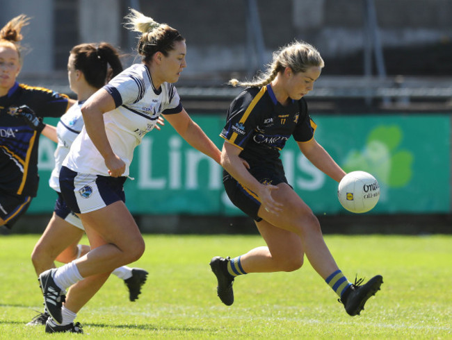 Grainne McGlade tackles Aisling McCarthy