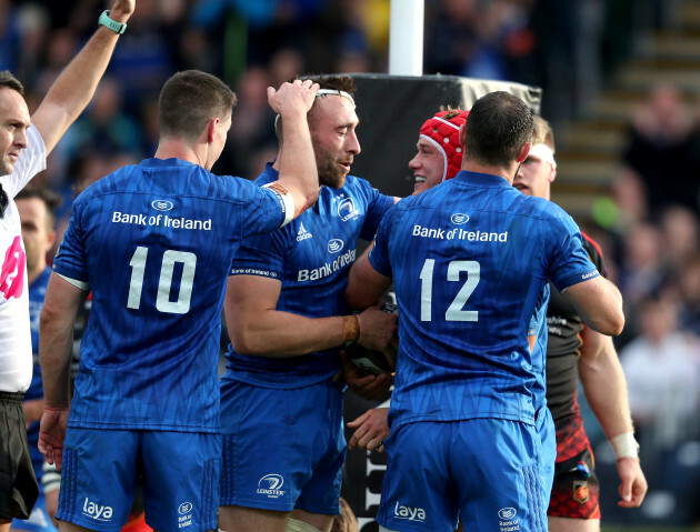 Josh van der Flier celebrates scoring a try with Jack Conan, Johnny Sexton and Robbie Henshaw