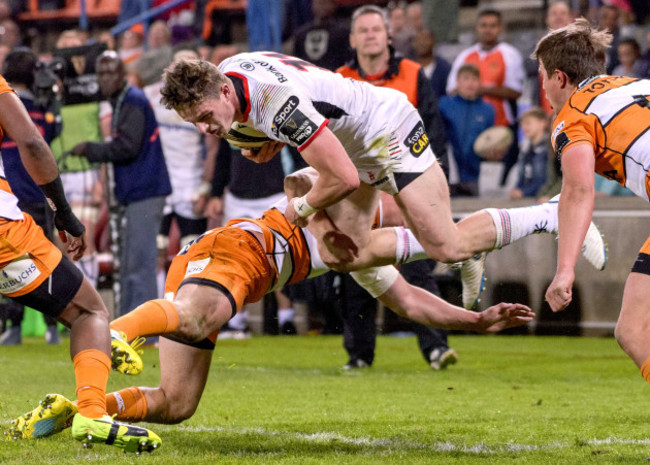 Angus Kernohan tackled by Benhard Janse van Rensburg