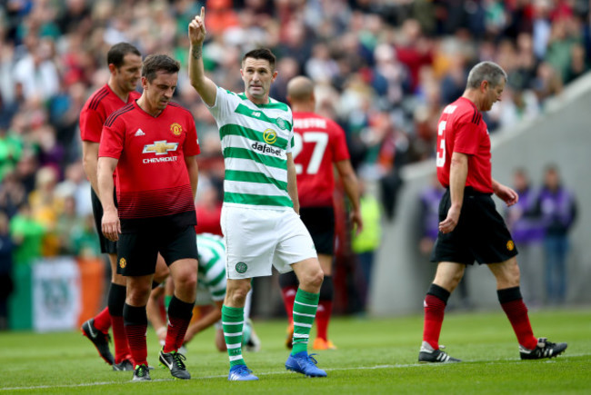 Robbie Keane celebrates scoring his side's opening goal