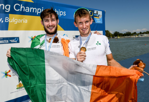 Paul and Gary O'Donovan celebrate with their gold medals