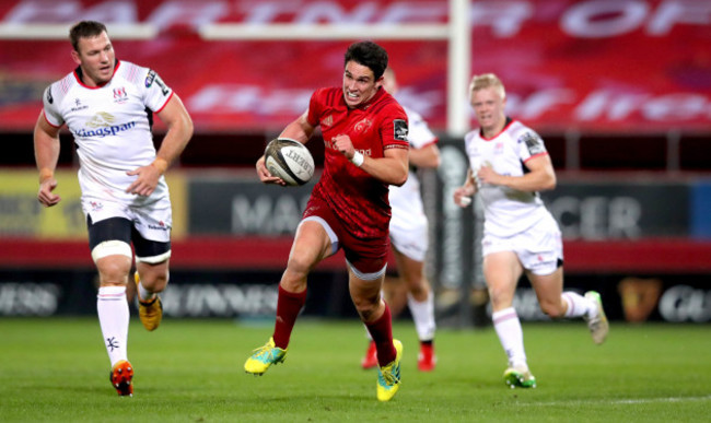 Joey Carbery breaks free on his way to scoring a try