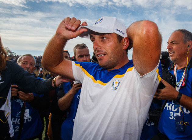 Francesco Molinari celebrates after defeating Phil Mickelson on the 16th to win the Ryder Cup