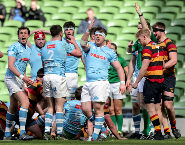Garryowen players react to a play made by Lansdowne