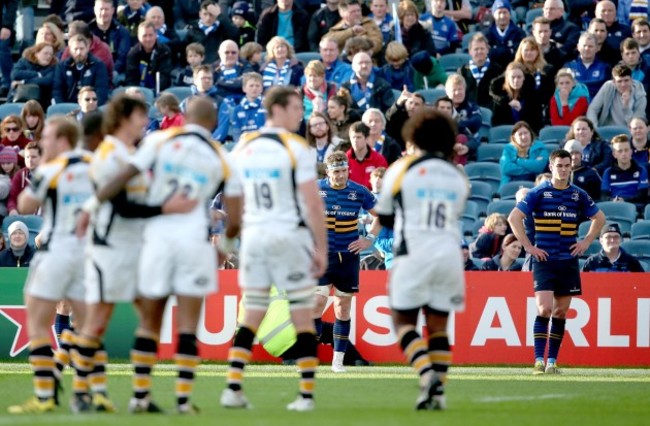 Jamie Heaslip and Jonathan Sexton dejected after the game