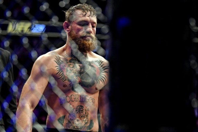 Conor McGregor dejected after losing