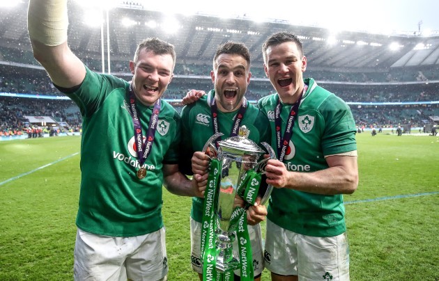 Peter O'Mahony, Conor Murray and Jonathan Sexton celebrate winning