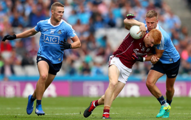 Paul Mannion and Jonny Cooper with Adrian Varley