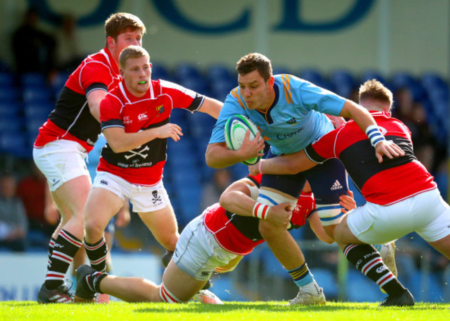 Travis Cooney tackles Stephen McVeigh