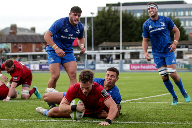 Charlie O’Doherty scores a try despite Adam Byrne