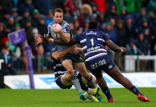 Jack Carty is tackle by Luke Braid and Thierry Paiva