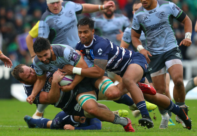 Colby Fainga'a is tackled by Luke Braid and Ulupano Seuteni