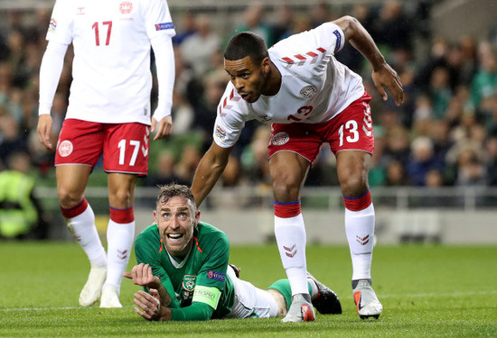 Richard Keogh shows his frustration with Mathias Jorgensen