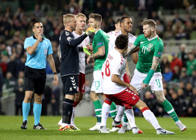 James McClean clashes with Kasper Schmeichel, Thomas Delaney and Mathias Jorgensen