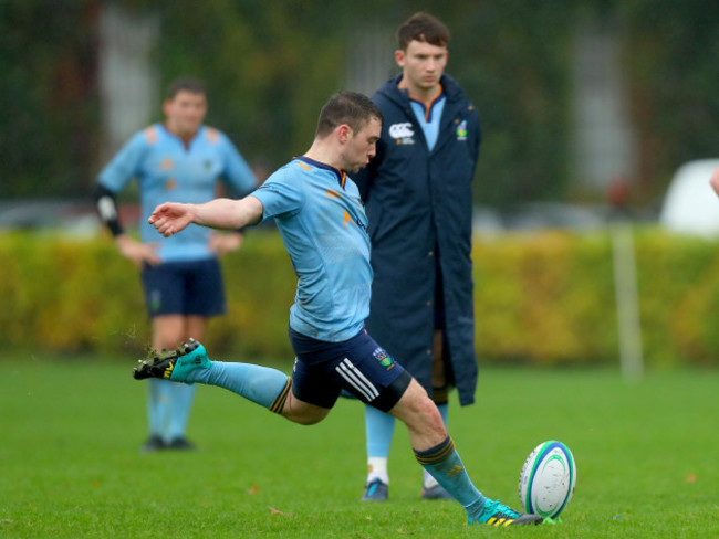 Cillian Burke kicks a conversion