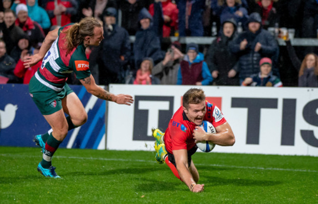 Jacob Stockdale celebrates scoring a try