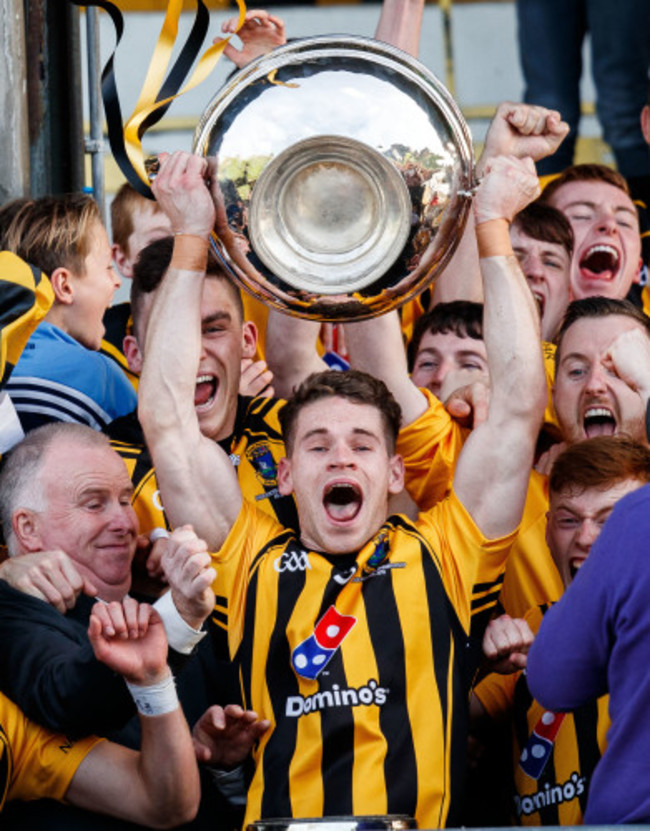 Cathal Finn lifts the trophy