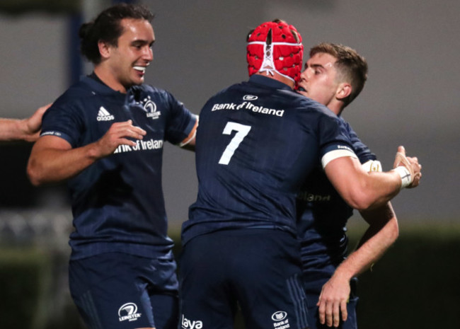 Luke McGrath celebrates scoring their fourth try with Josh van der Flier and James Lowe 12/10/2018